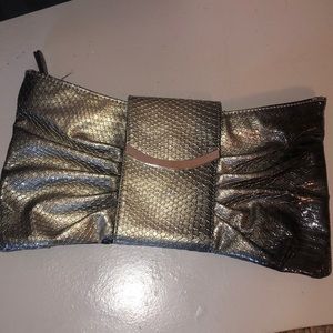 Cute Express faux leather clutch